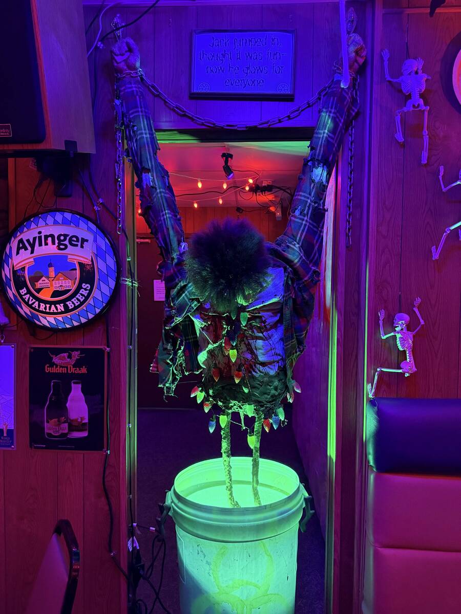 With red lighting and plenty of props, The Silver Stamp bar in downtown Las Vegas transforms ev ...