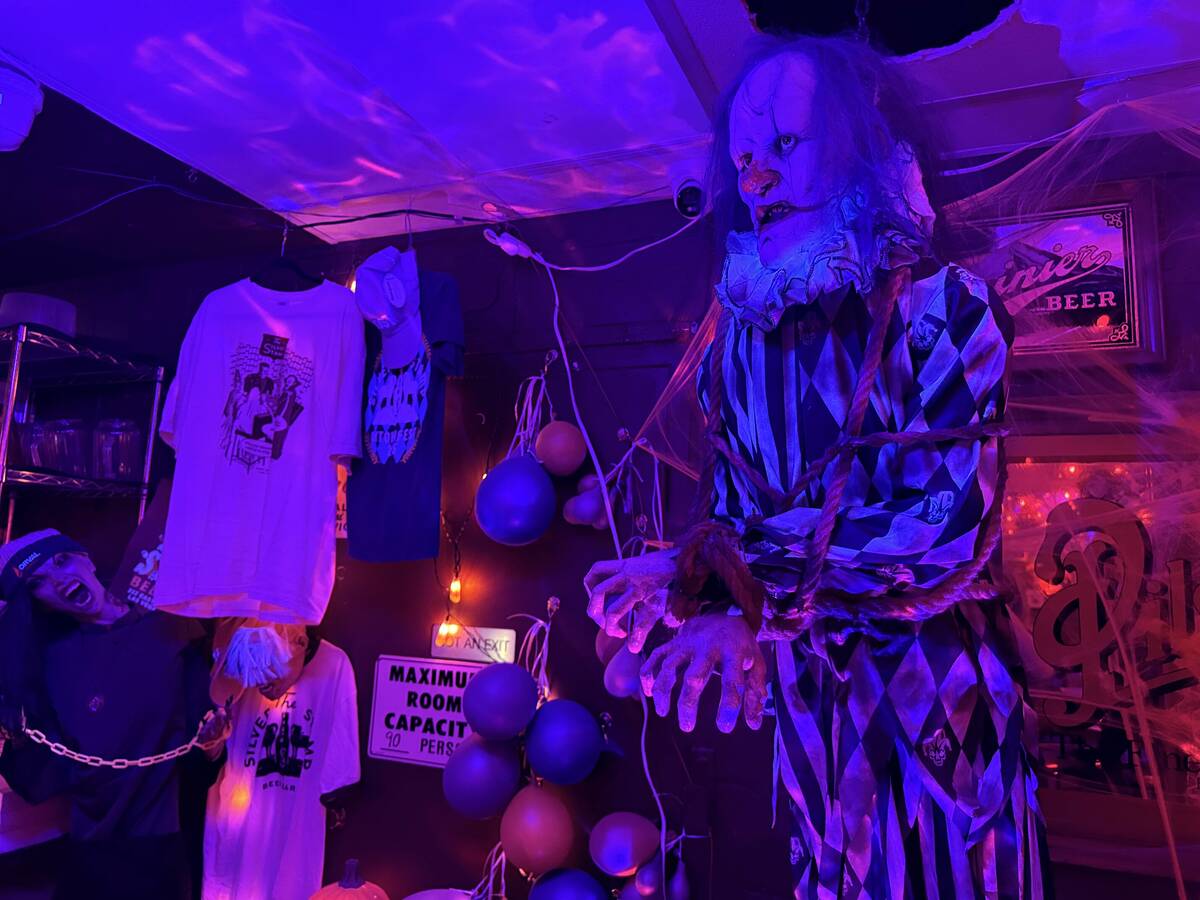 With red lighting and plenty of props, The Silver Stamp bar in downtown Las Vegas transforms ev ...