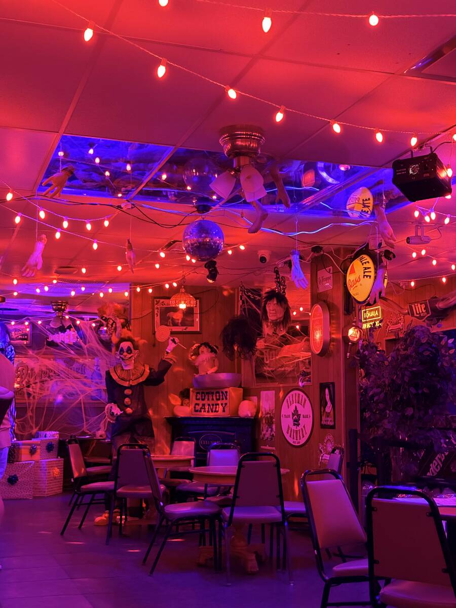 With red lighting and plenty of props, The Silver Stamp bar in downtown Las Vegas transforms ev ...