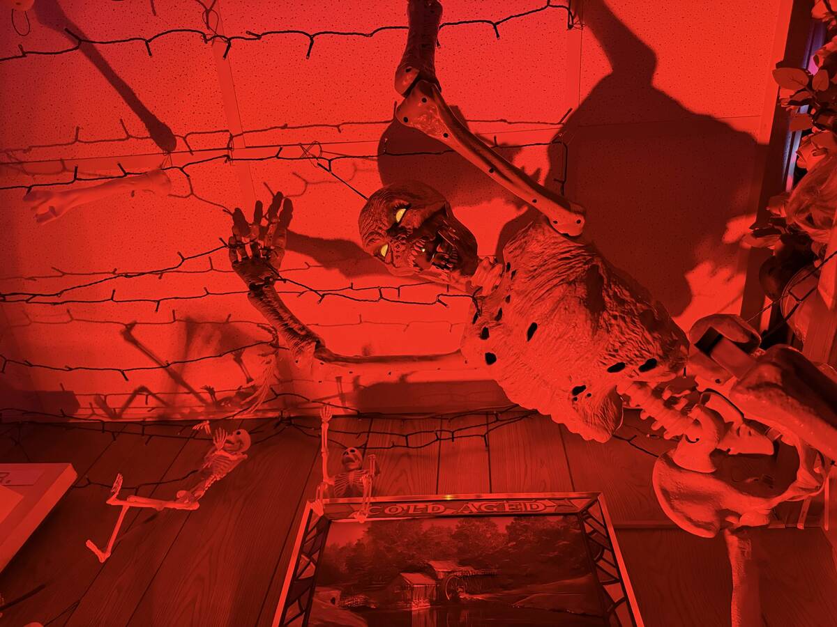 With red lighting and plenty of props, The Silver Stamp bar in downtown Las Vegas transforms ev ...