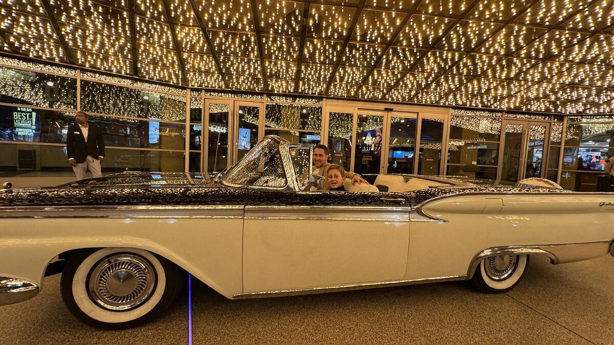 Plaza CEO Jonathan Jossel and his son Noah are shown in the Cadillac convertible driven by star ...