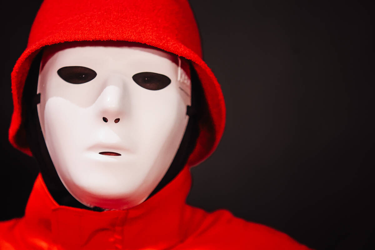 A Jabbawockeez member poses on the red carpet for the Jabbawockeez' return to the stage af ...