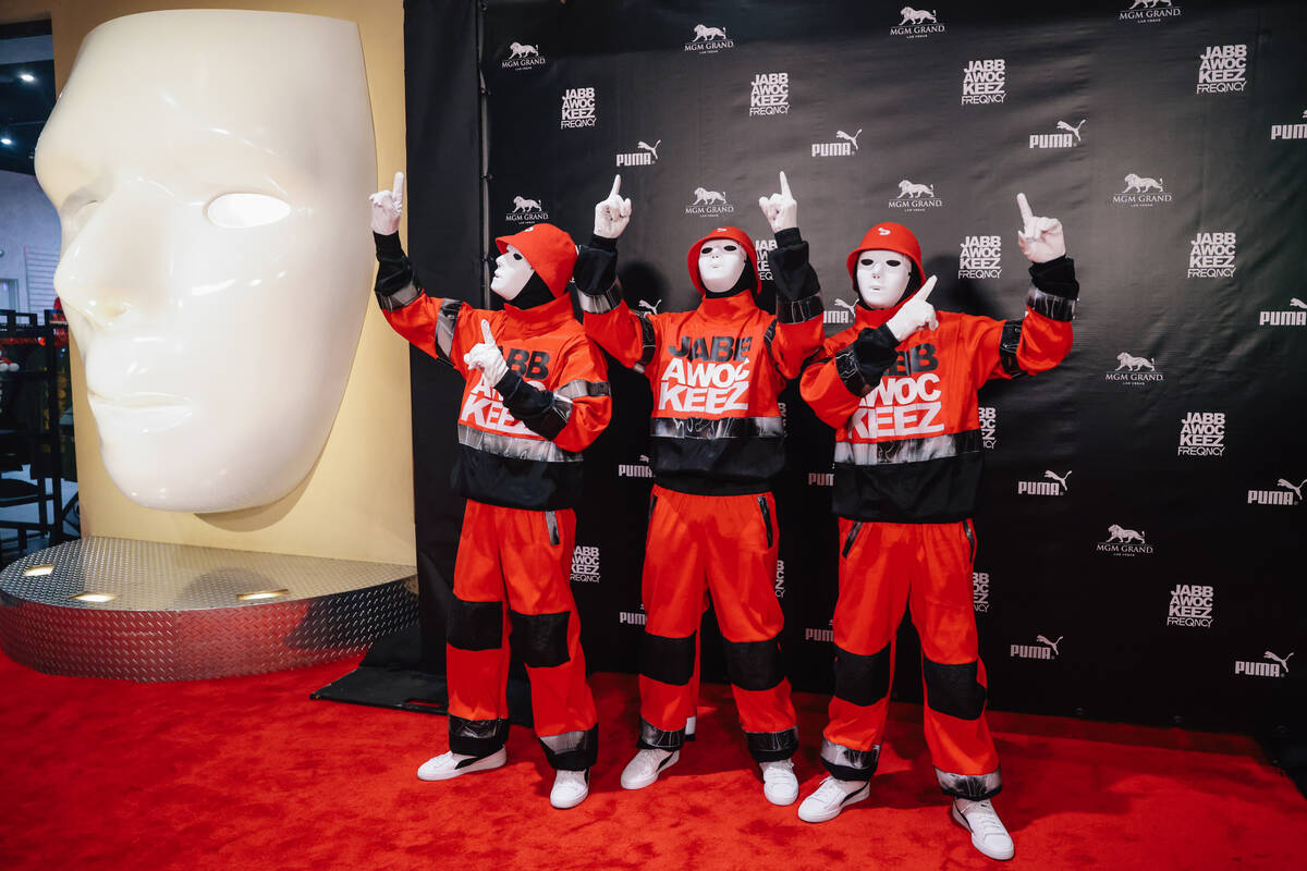 The Jabbawockeez' pose on the red carpet for their return to the stage after a five-week ...