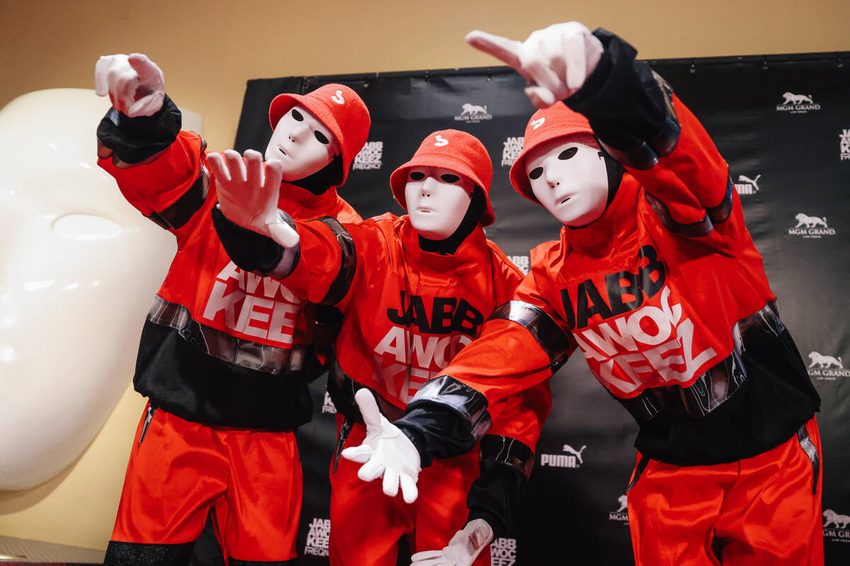 The Jabbawockeez' pose on the red carpet for their return to the stage after a five-week ...