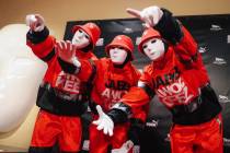 The Jabbawockeez' pose on the red carpet for their return to the stage after a five-week ...