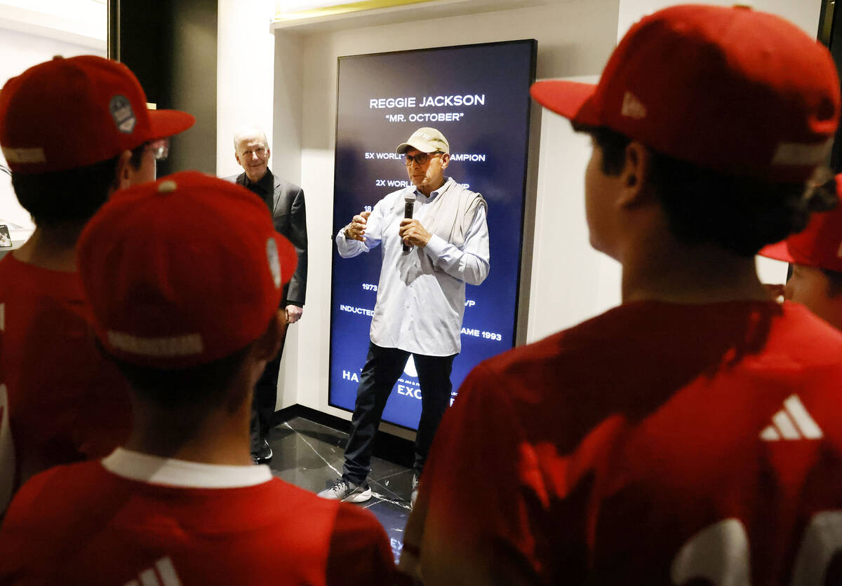 Reggie Jackson, a Baseball Hall of Famer, speaks as Summerlin South Little League team, champio ...