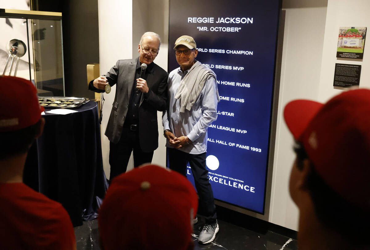 Sportscasting legend Jim Gray, left, and Reggie Jackson, a Baseball Hall of Famer, prepare to p ...
