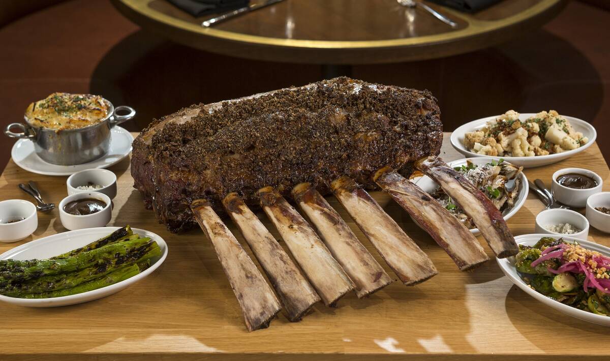 The Tomahawk Feast at ONE Steakhouse, inside Virgin Hotels Las Vegas, features an 18-pound USDA ...