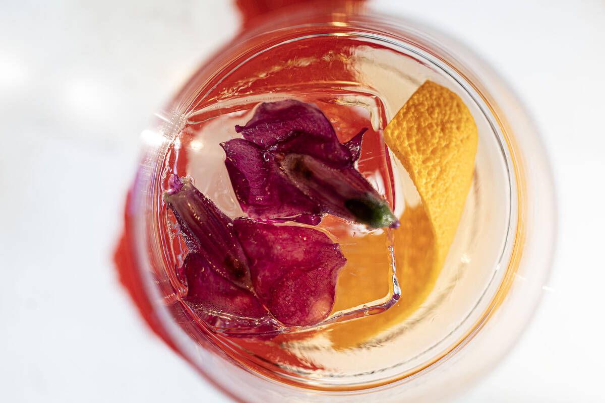 A light of the pear cocktail is photographed at Gastropub Nisei Wednesday, Oct. 29, 2025 in Las ...