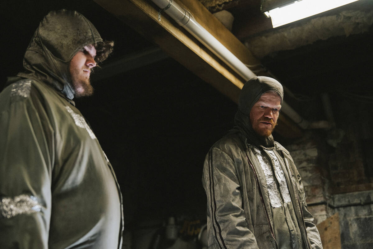 This image released by Focus Features shows Aidan Delbis, left, and Jesse Plemons in a scene fr ...