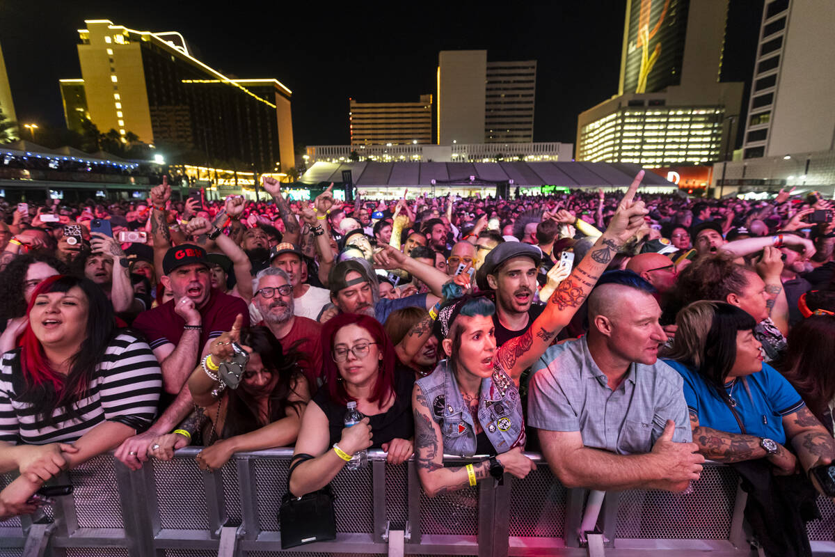 Attendees watch as Cock Sparrer performs during the first day of the Punk Rock Bowling music fe ...
