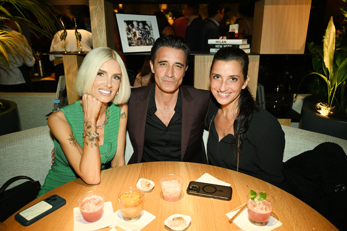 Nicole Young, Gilles Marini and Carole Marini attend BOA Steakhouse grand opening at Grand Cana ...