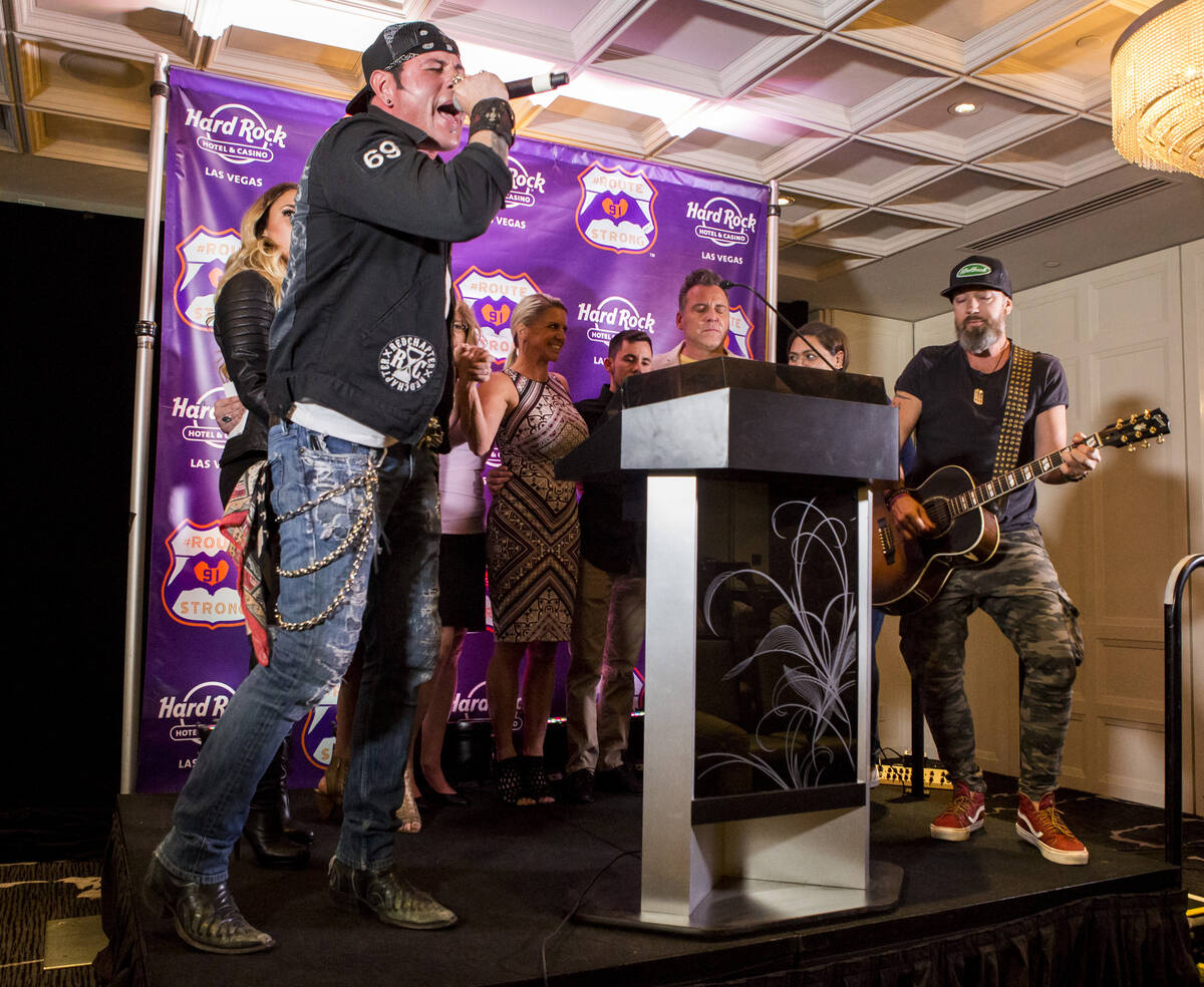 Bryan Hopkins, left, and Ben Carey of the band Elvis Monroe perform their song "The Fight" at t ...