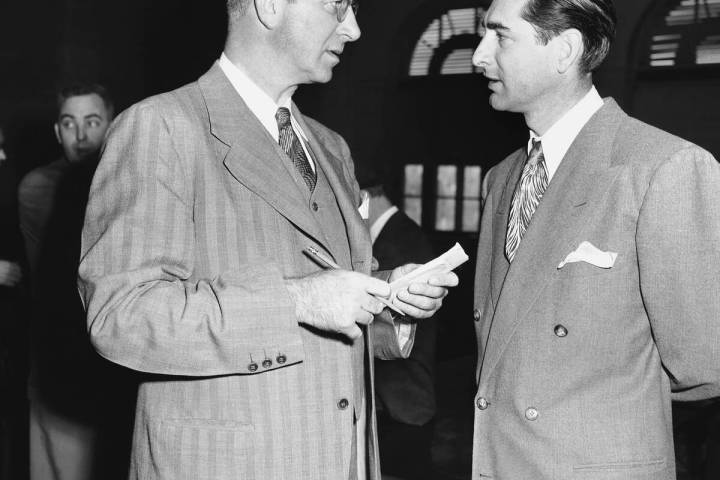 Sen. Estes Kefauver (D-Tenn), left, talks with the lieutenant governor of Nevada, Cliff Jones d ...