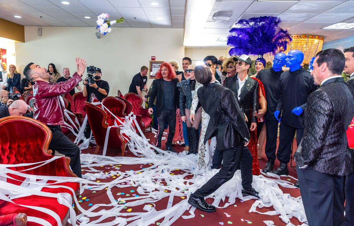 Donnie Wahlberg with the New Kids on the Block tosses a bouquet to Entertainment Tonight's ...