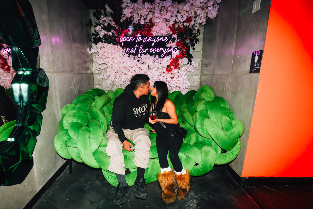 A couple kisses at Bauhaus Vegas, a new techno club, Saturday, Nov. 8, 2025, in Las Vegas. (Mad ...