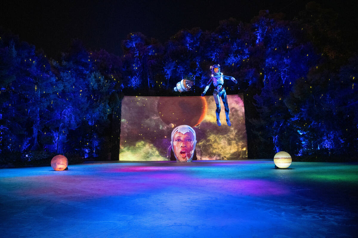 The "Space Oddity" performance at the Wynn's Lake of Dreams show features a female astronaut wh ...