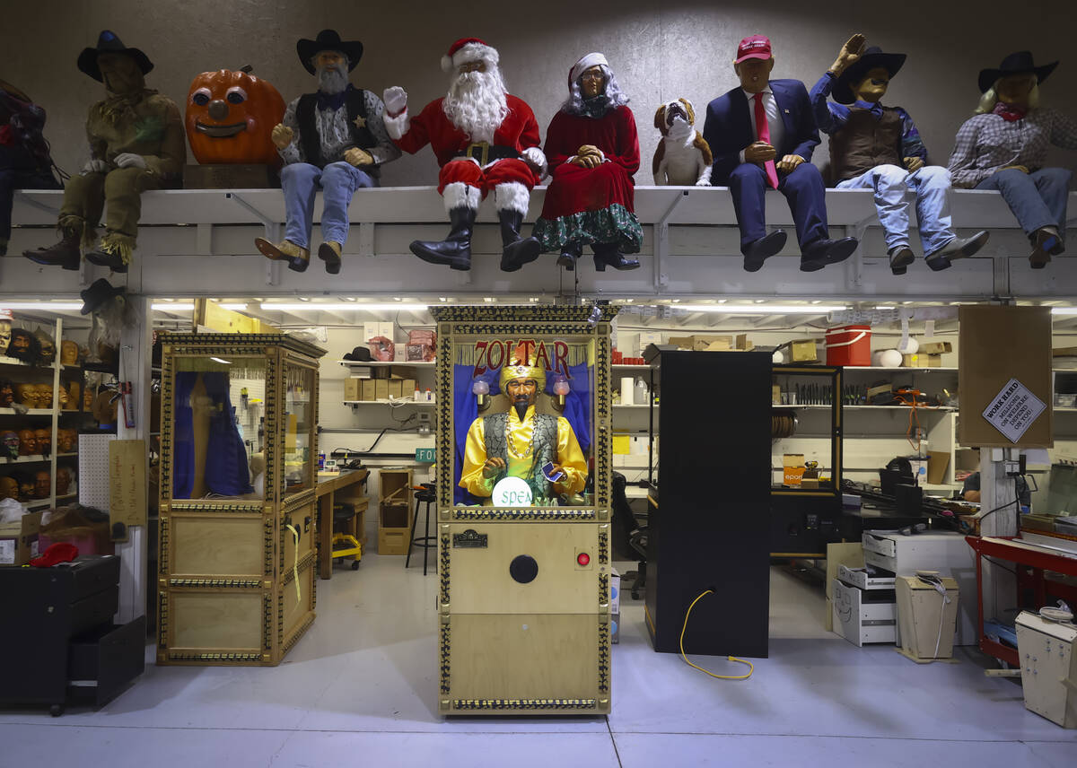 A Zoltar fortune teller machine, center, is seen during a tour of Characters Unlimited, which p ...