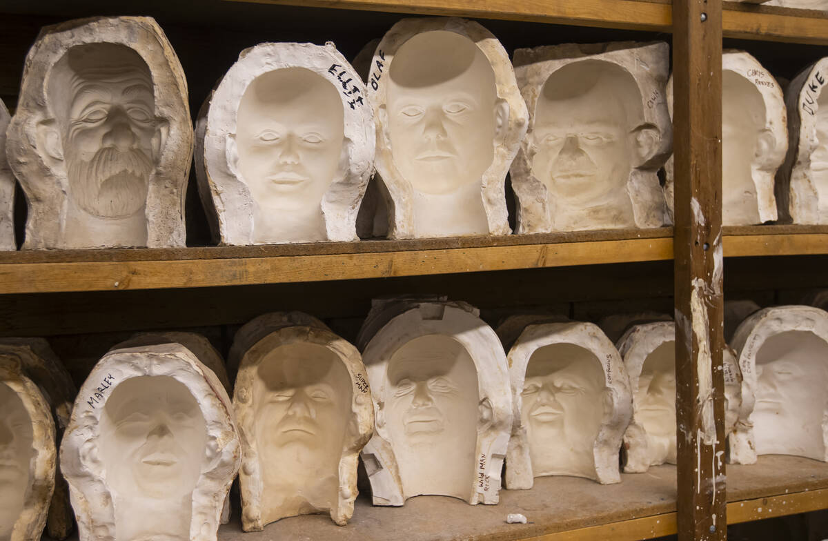 Face molds are seen during a tour of Characters Unlimited, which produces life-size animatronic ...