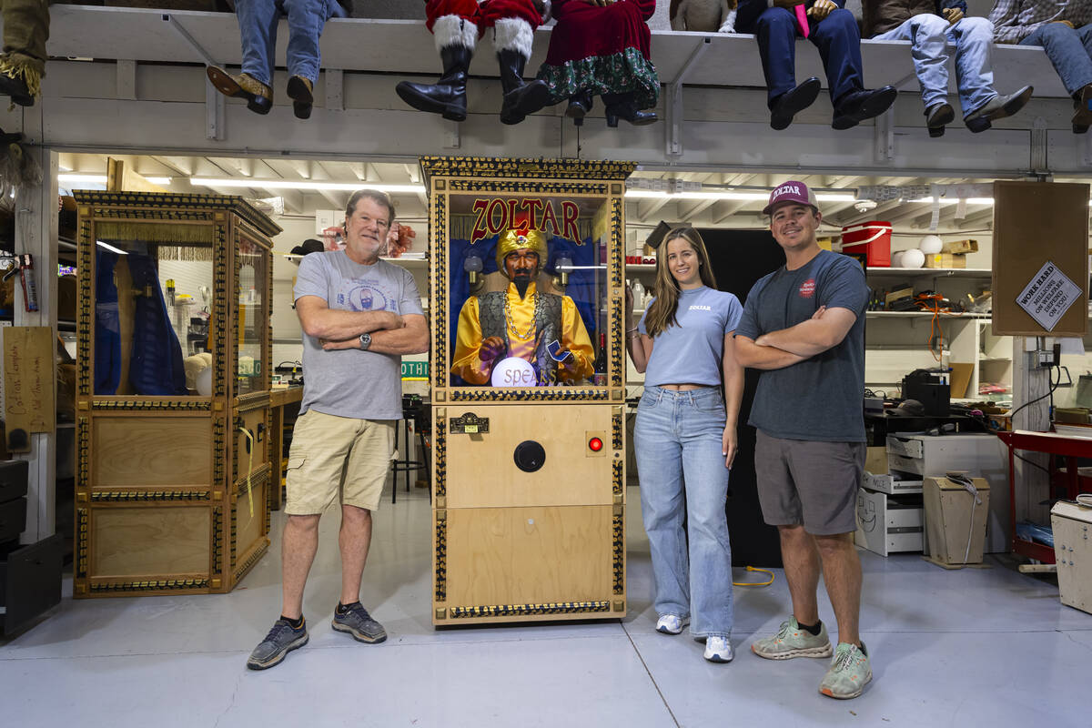 Olaf Stanton, president and CEO of Characters Unlimited, left, poses with children Karina Multa ...