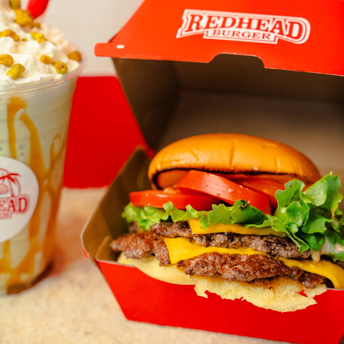 A Double Cheeseburger with classic fixings from Redhead Burger of Miami Beach, Florida. The res ...