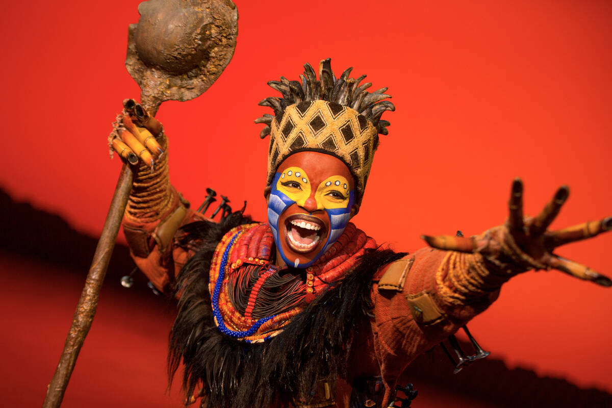 Mukelisiwe Goba performs as Rafiki in a production of The Lion King. (Matthew Murphy)