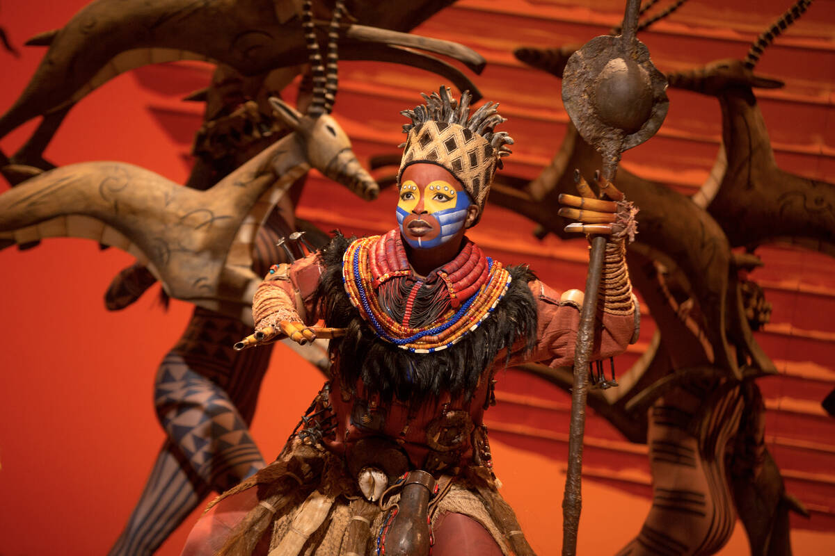 Mukelisiwe Goba performs as Rafiki in a production of The Lion King. (Matthew Murphy)
