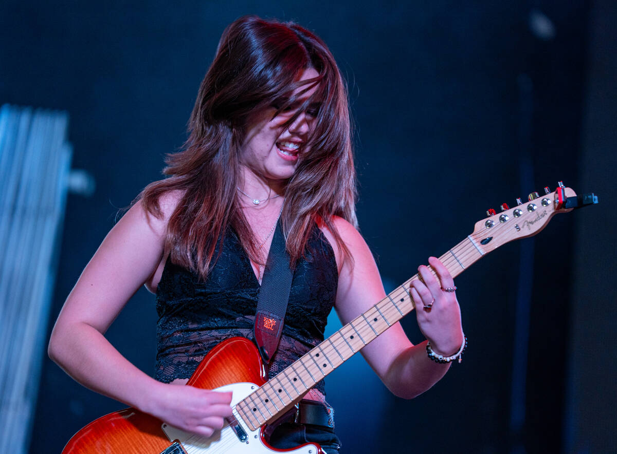 The Dollheads preform on the Main Street stage during the Neon City Music Festival on Fremont S ...