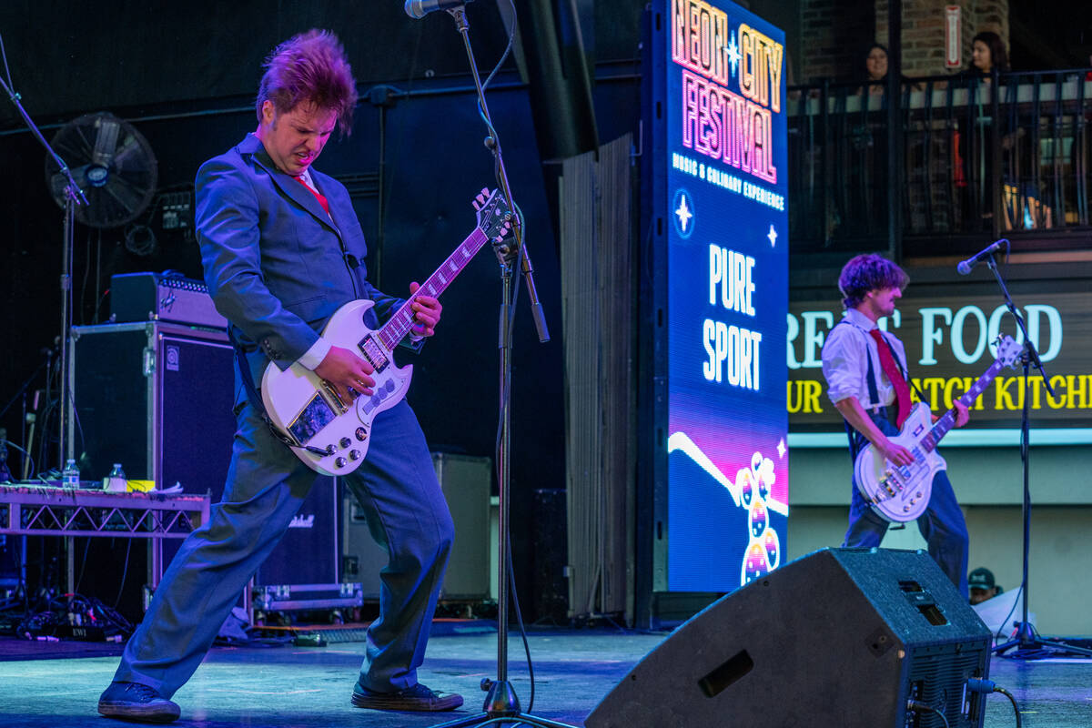 Pure Sport preforms on the First Street stage during the Neon City Music Festival on Fremont St ...