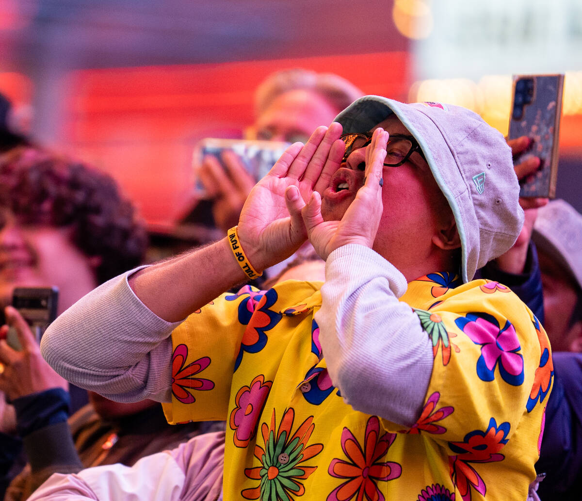 Fans cheer as De La Soul preforms on the Third Street stage during the Neon City Music Festival ...