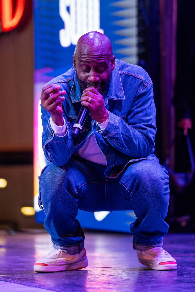 Kelvin Mercer of De La Soul crouches while preforming on the Third Street stage during the Neon ...