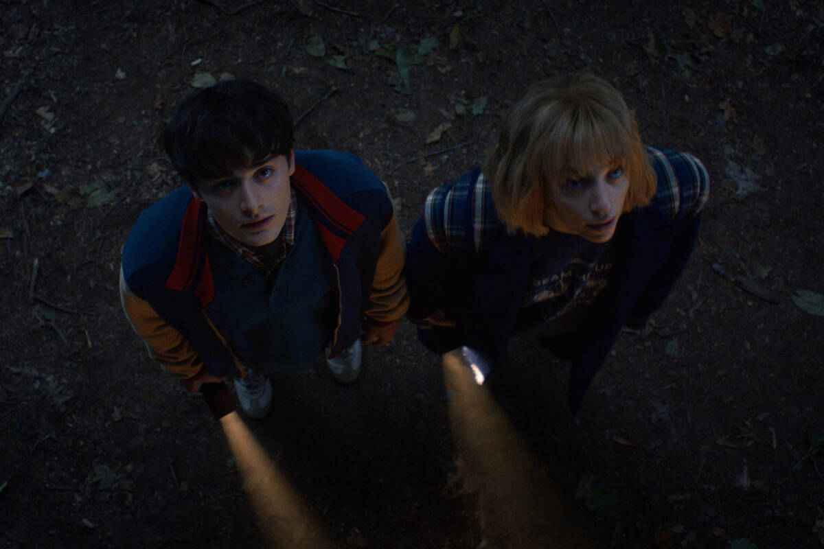 Noah Schnapp as Will Byers and Maya Hawke as Robin Buckley in "Stranger Things" season five. (N ...