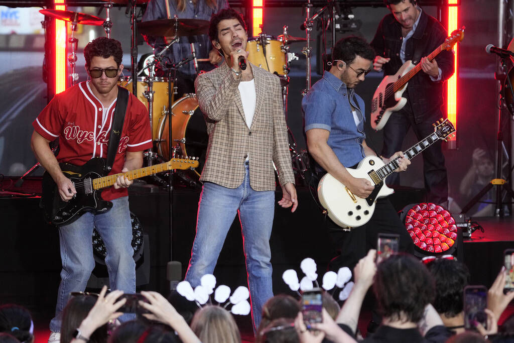 Nick Jonas, from left, Joe Jonas and Kevin Jonas from the Jonas Brothers perform on NBC's Today ...