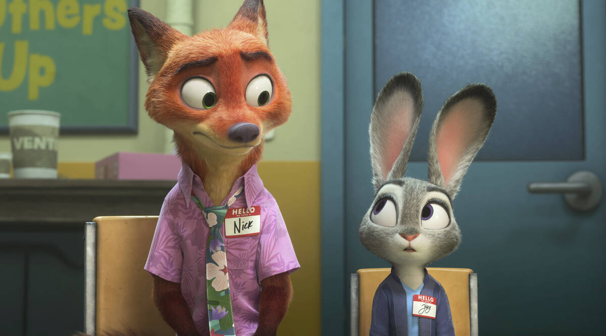 This image released by Disney shows Nick Wilde, voiced by Jason Bateman, left, and Judy Hopps, ...