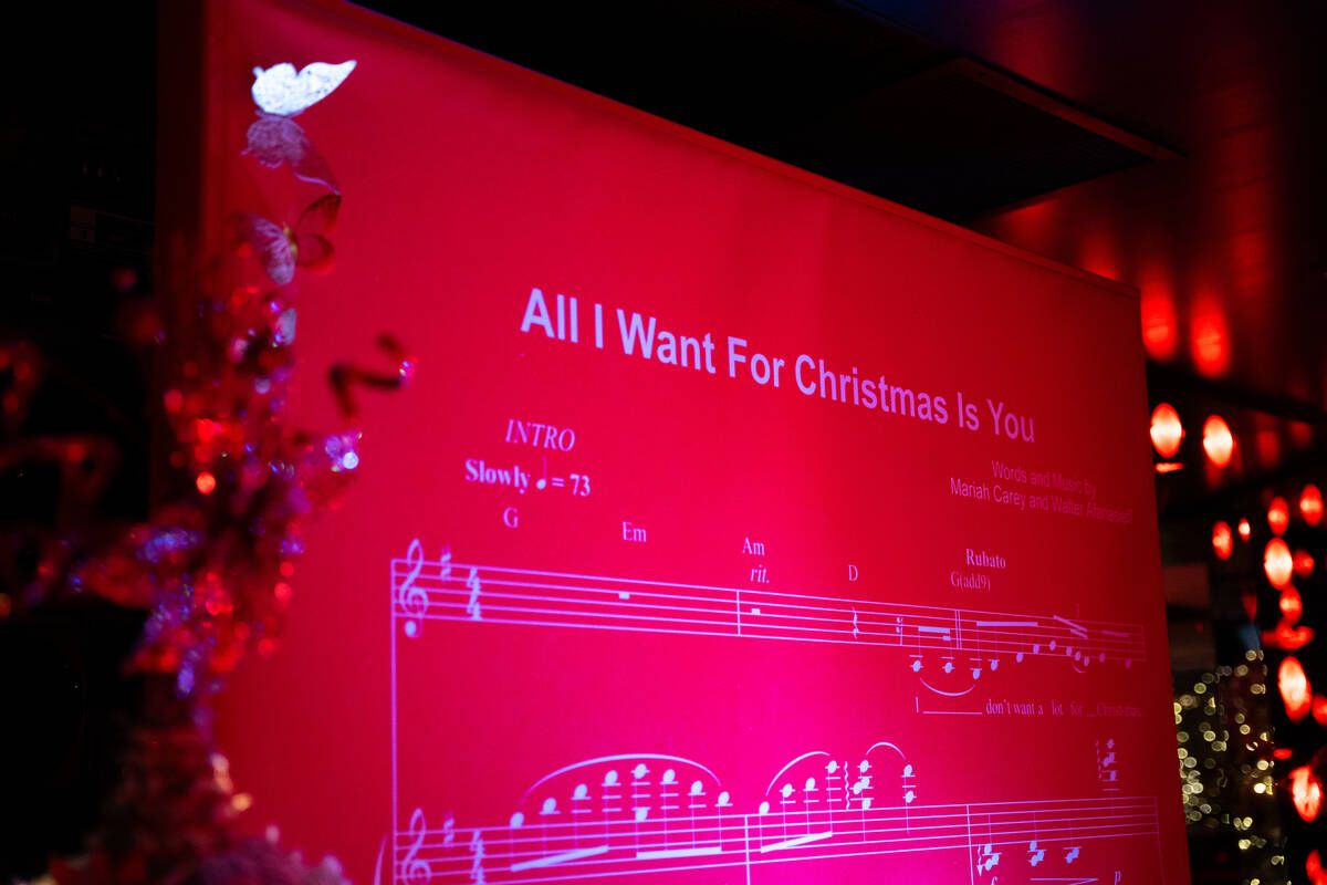 Photo opportunities are set up for guests inside The Mariah Carey Holiday Bar pop-up at On the ...