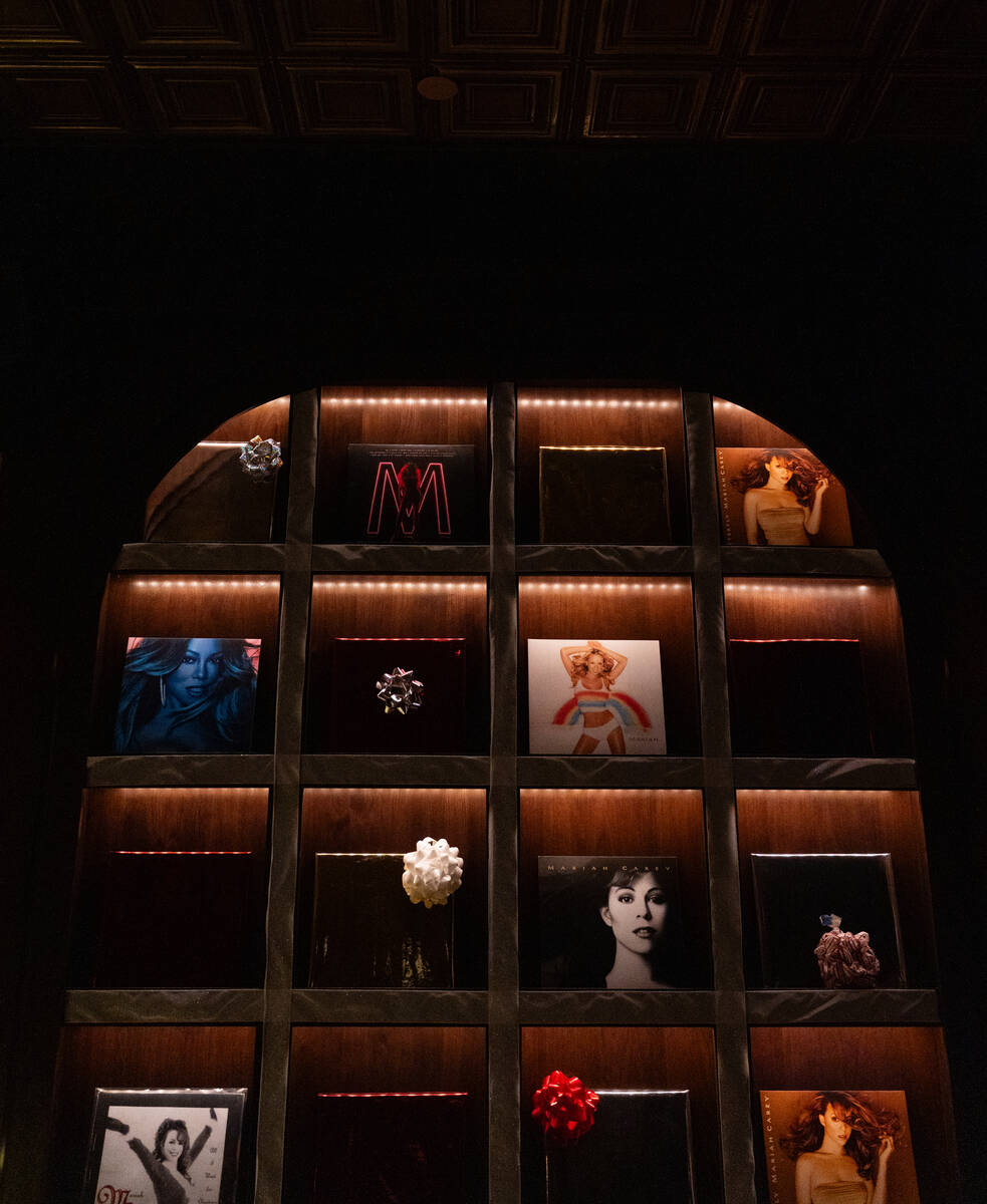 Records are displayed with bows inside one of the rooms at The Mariah Carey Holiday Bar pop-up ...