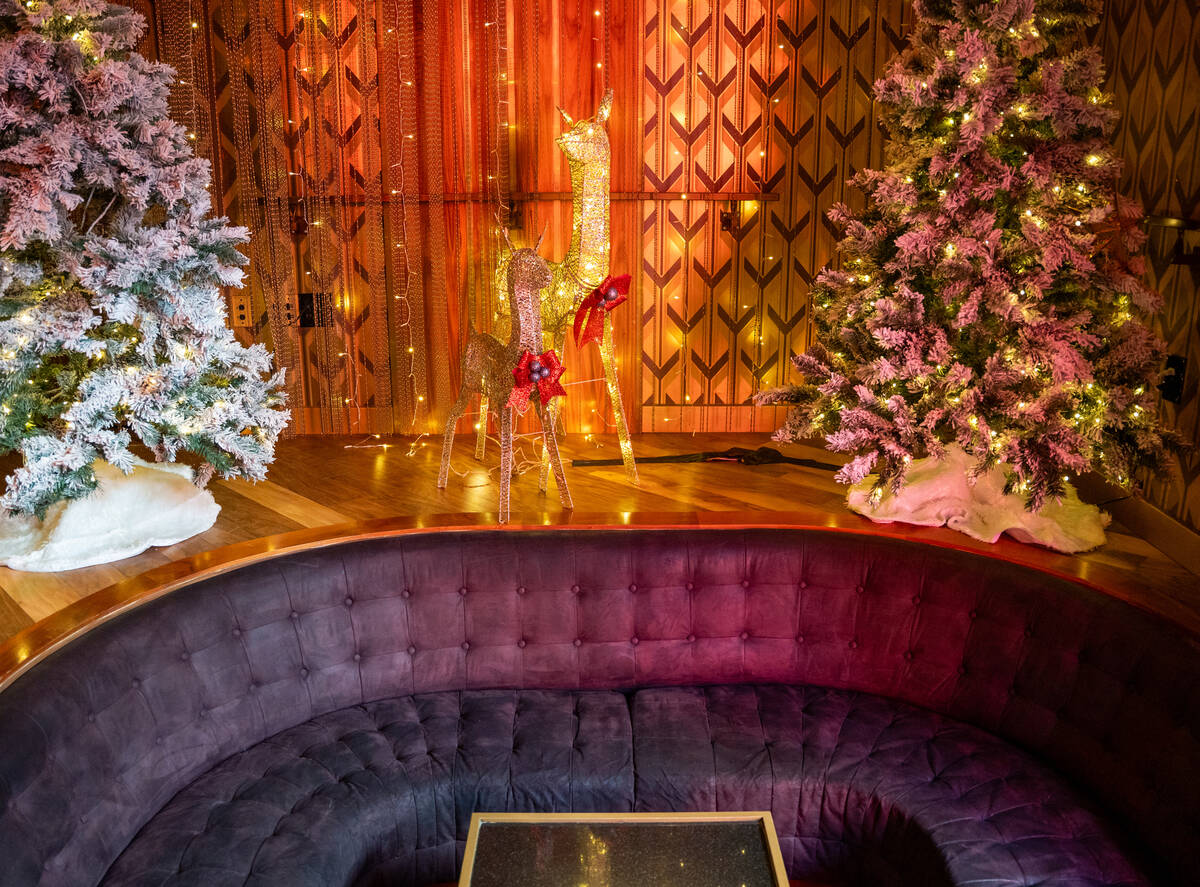A table is seen decorated for The Mariah Carey Holiday Bar pop-up at On the Record at Park MGM ...
