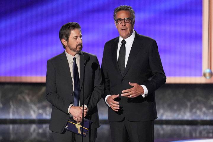 Ray Romano, left, and Brad Garrett present the award for outstanding comedy series during the 7 ...