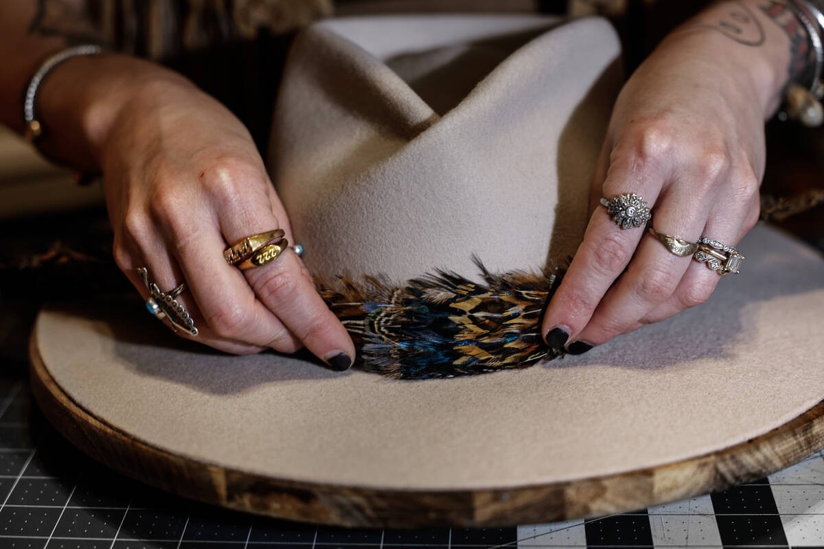 Desert Bird Hat Co owner Kelly Sokoloski makes a custom made hat Friday, Sept. 26, 2025 in Las ...