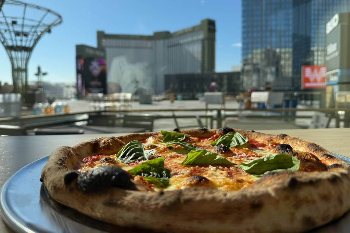 An OG Pizza with a view of the Las Vegas Strip from How Ya Dough'n, which is set to open a ...