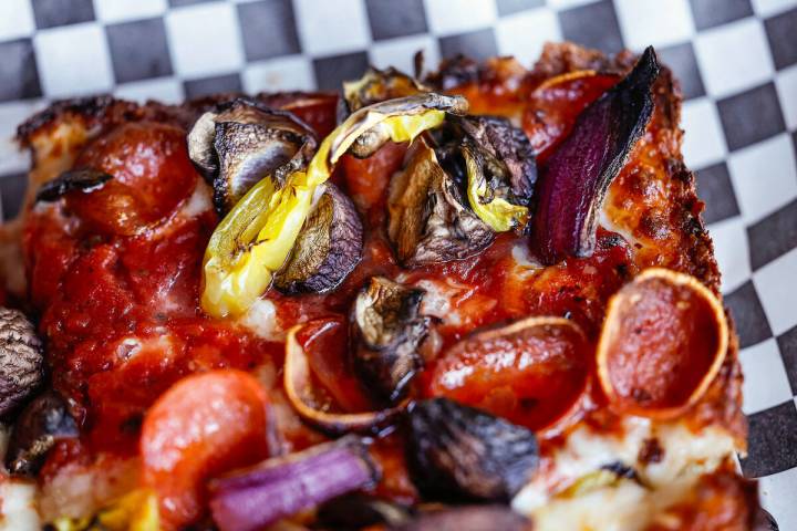 A build your own pizza with pepperoni, mushroom, red onion and banana peppers is seen at Guerri ...