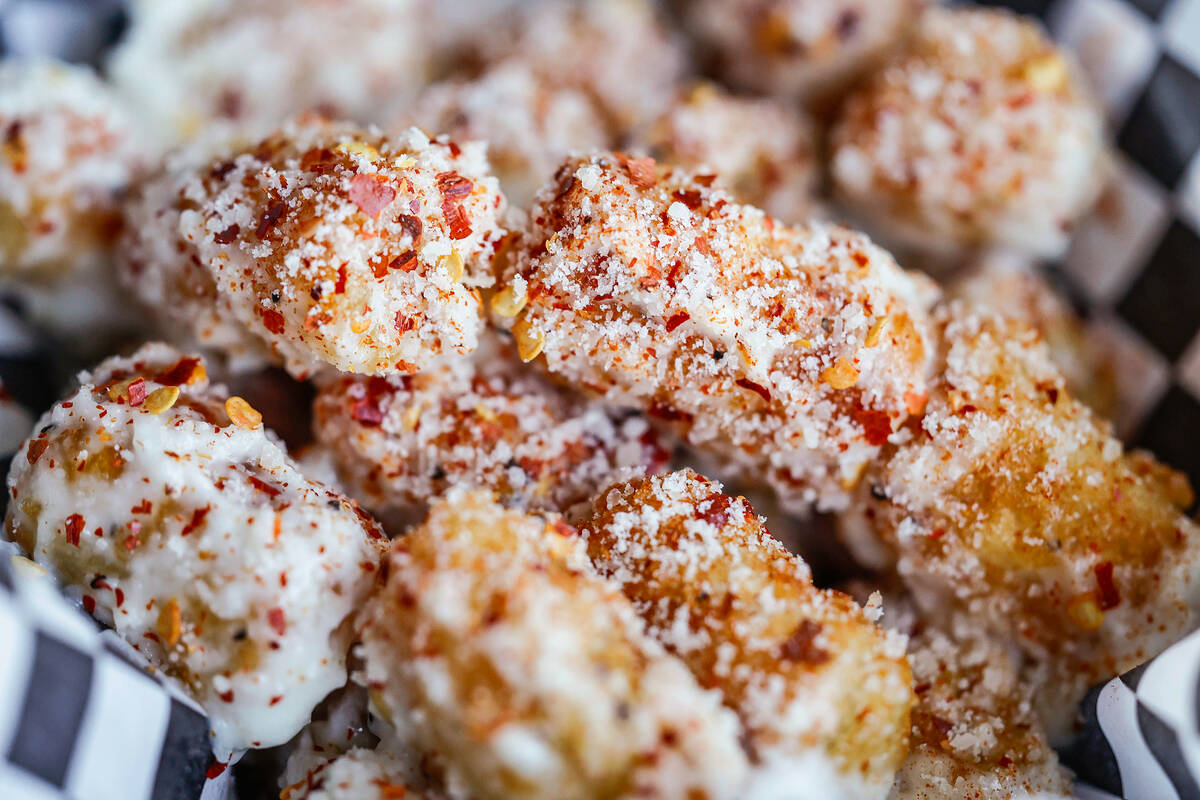 Garlic parm tots are seen at Guerrilla Pizza Wednesday, Dec. 3, 2025 in Las Vegas. (Benjamin Ha ...