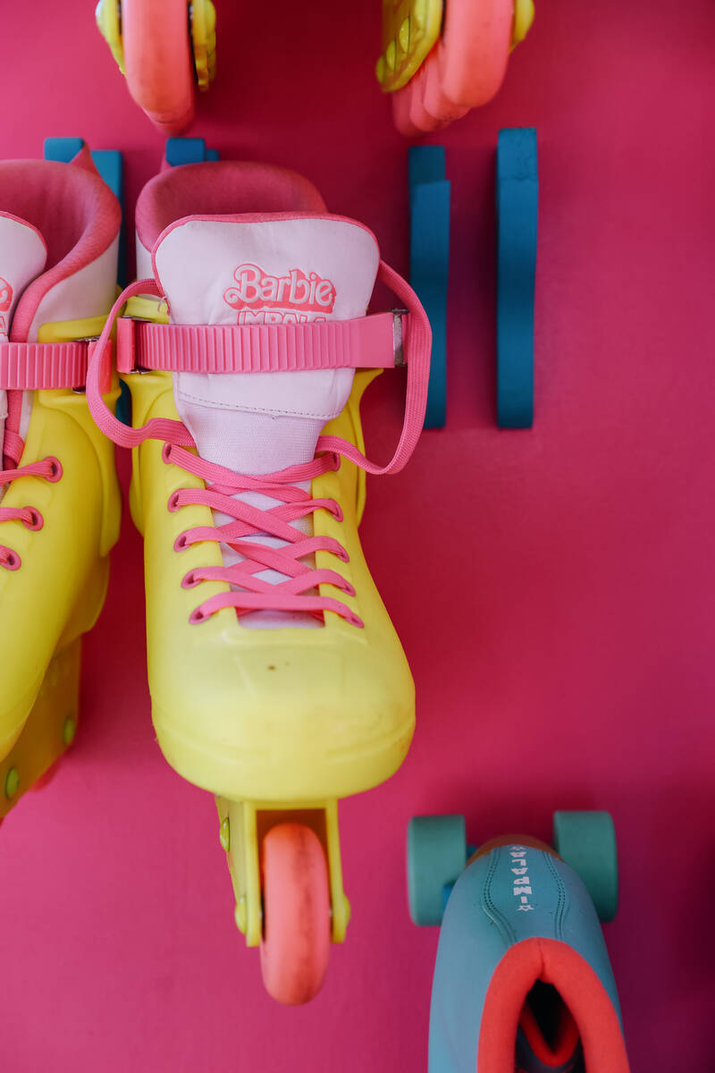 Roller skates hang on a wall near the roller rink during a media preview of the Malibu Barbie C ...