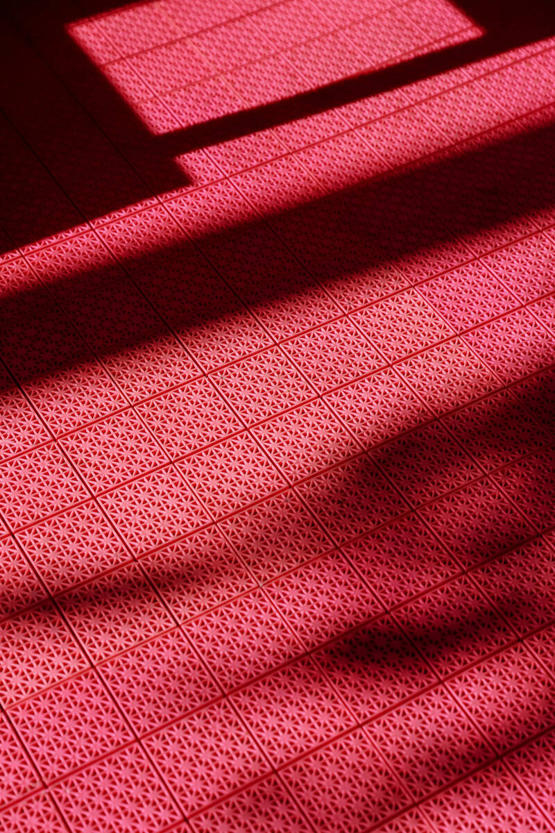 Light dances across the surface of the roller rink during a media preview of the Malibu Barbie ...