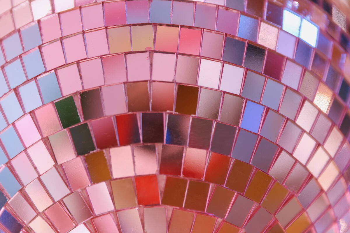 A disco ball hangs above the bar at the Malibu Barbie Cafe on Wednesday, Dec. 17, 2025 at Area ...