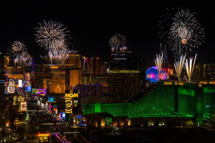 Fireworks erupt over the Strip as part of New Year's Eve celebrations across the city as v ...