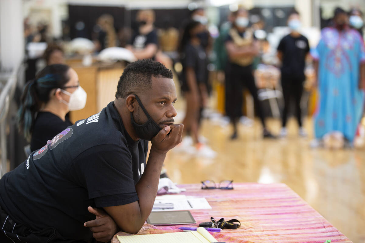 Founding director of Broadway in the HOOD, Torrey Russell, supervises a rehearsal for the group ...
