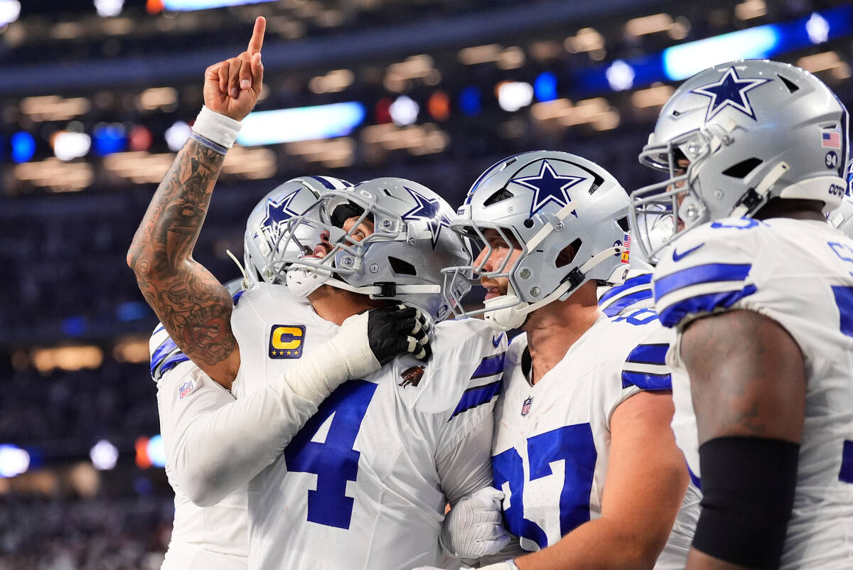 Dallas Cowboys quarterback Dak Prescott (4) celebrates his rushing touchdown during the second ...