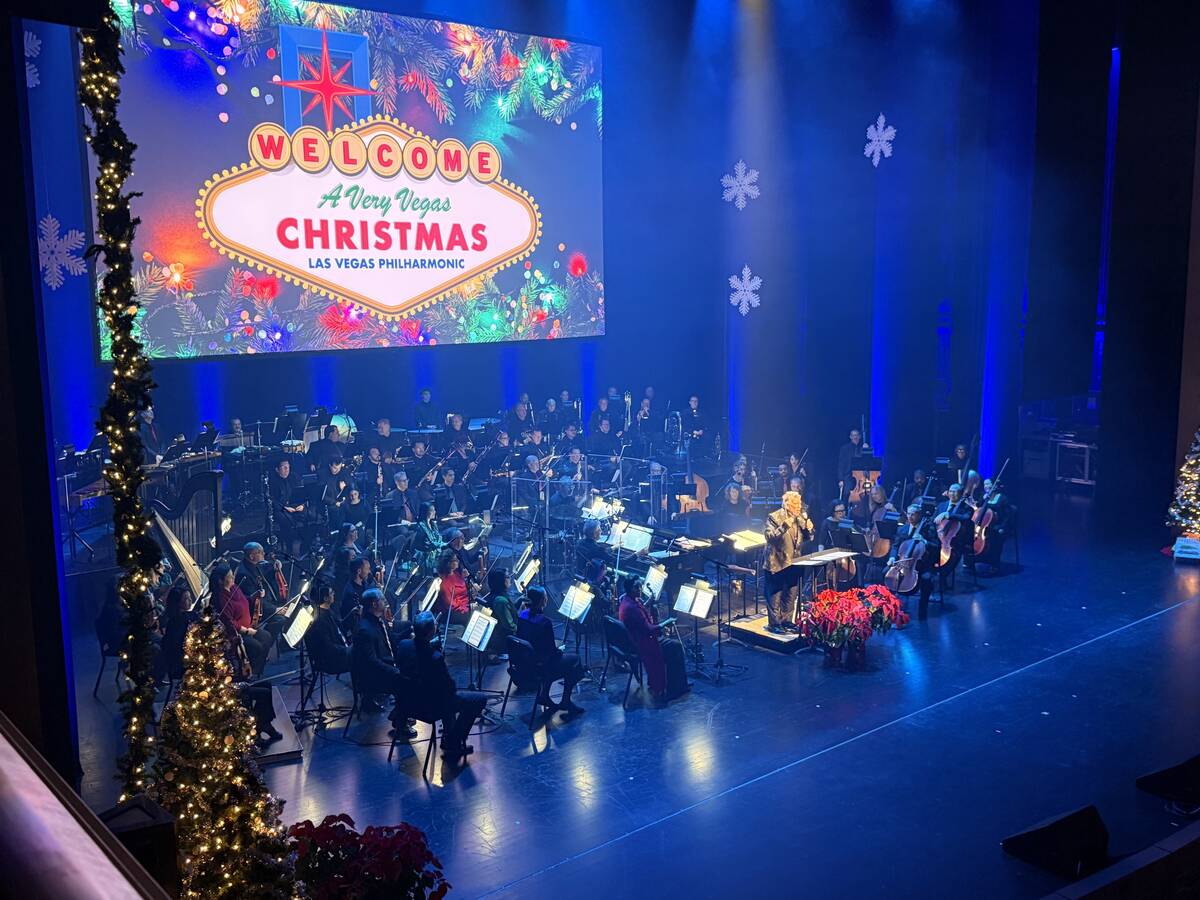 Las Vegas Philharmonic and conductor George Daugherty are shown at "A Very Vegas Christmas" at ...