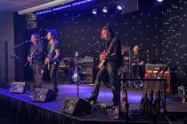 Phil Soussan, center, is shown with guitarists Zach Throne, left, Christian Brady, right, and d ...